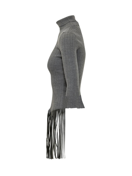 https://imageboutique.it › prodotti › simona-corsellini-cpmgq0801-maglia-dolcevita-con-frange