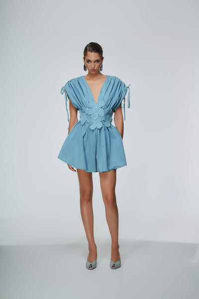https://imageboutique.it › prodotti › odi-odi-cadimare-tutina-con-dettagli-floreale-3d
