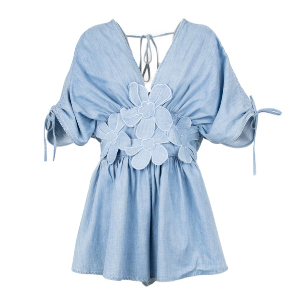 https://imageboutique.it › prodotti › odi-odi-cadimare-tutina-con-dettagli-floreale-3d