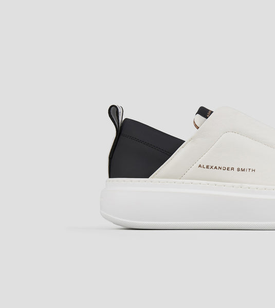 https://imageboutique.it › products › alexander-smith-asbcwlw0600wbk-wembley-slip-on-donna-in-pelle-bianca-e-tallone-nero
